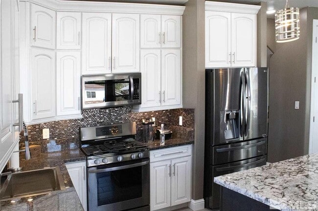 Photo - Custom built in 2021; 3-bedroom 2.5-baths; 2-car garage plus 2 off-street spaces