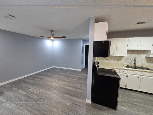 Living Room/Kitchen - 6160 Wooded Way Unit 6160 A