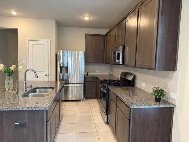 Photo - 8711 Windsong Trail Dr