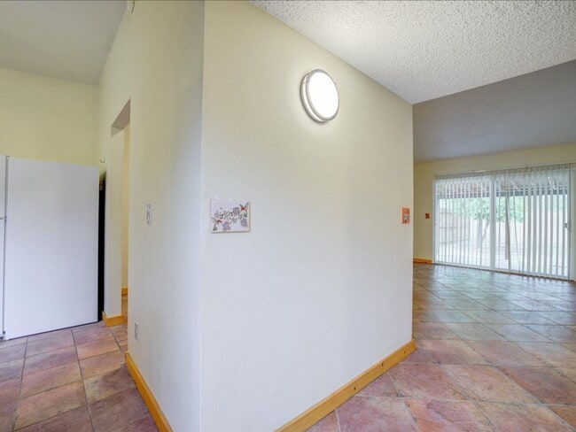 Photo - Charming 4-Bedroom Home with Spacious Living & Private Backyard!