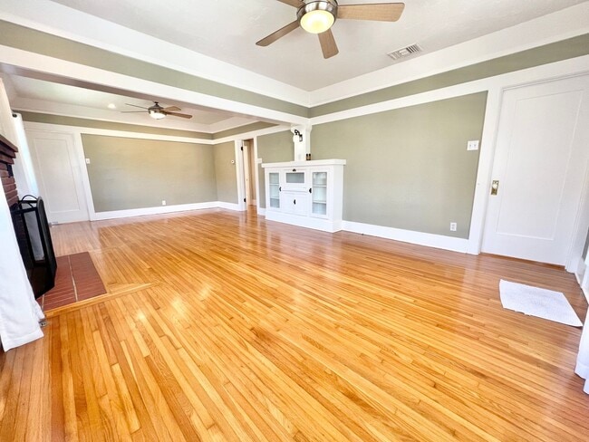 Photo - Charming 2BD/1BA with Hardwood Floors & Spacious Backyard Near Colorado Lagoon