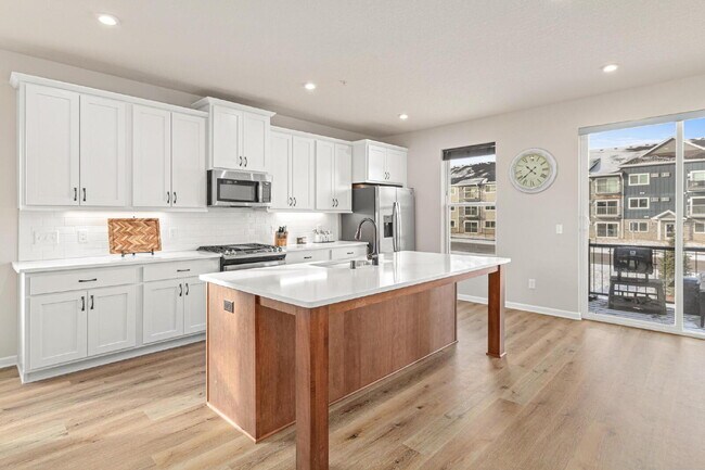 Photo - "Spacious 3-Bed Townhouse with 2.5 Baths in Maple Grove – A Perfect Retreat at 2405 Sq Ft!"