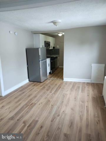 Photo - 100 E Holly Unidad 2M