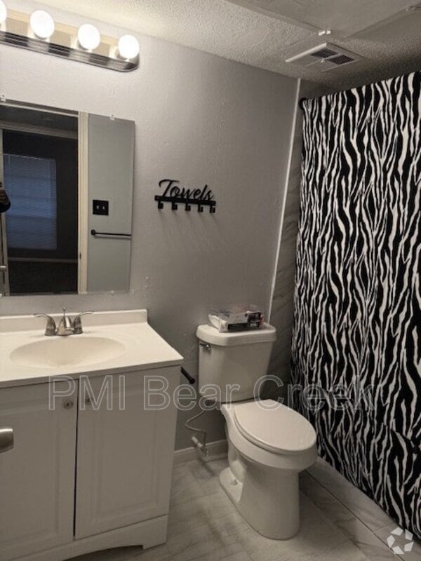 Building Photo - 9550 Deering Dr Unit #204 Rental
