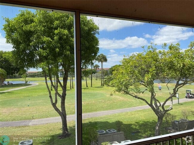 Building Photo - 850 SW 133rd Terrace Unit B-204 Rental