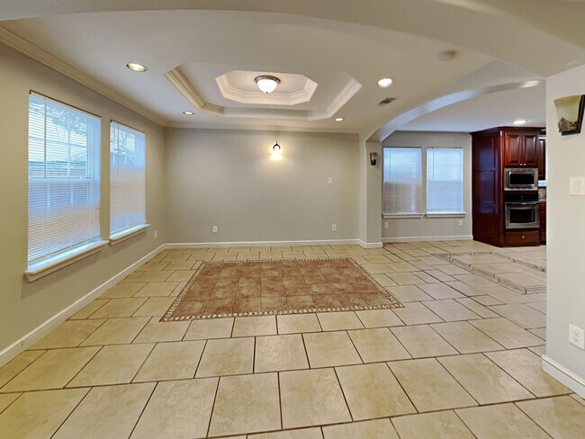 Photo - Spacious 4 Bed 2 Bath Home with Fireplace, Covered Patio & Fenced Yard in Denton, TX