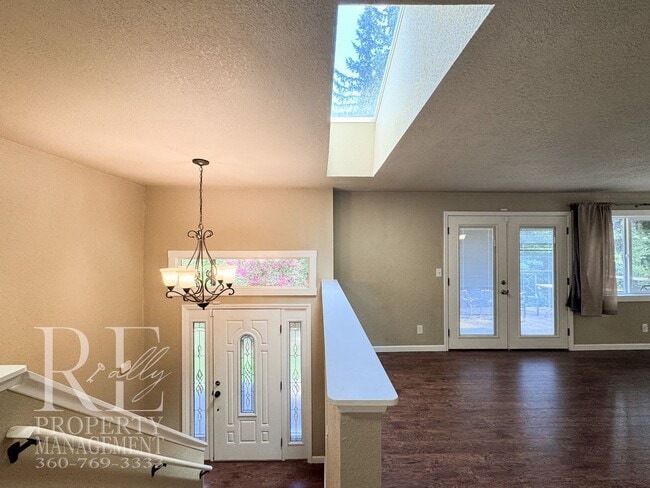 Photo - Bright & Spacious Split-Level Home with Gourmet Kitchen, Skylight & Expansive Yard