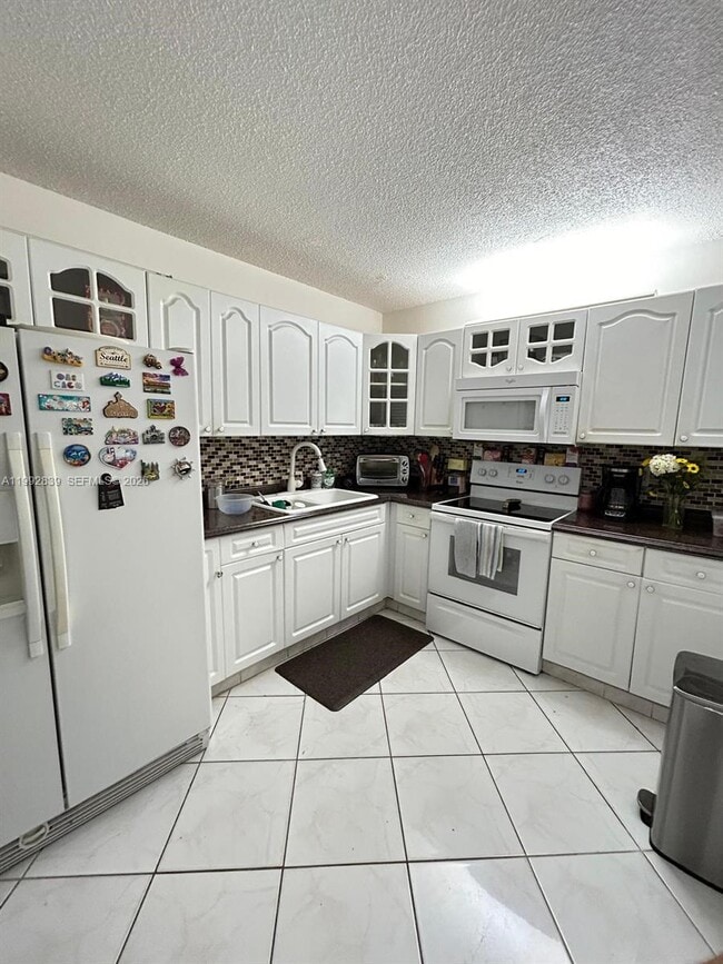 Building Photo - 17000 NW 67th Ave Unit 123