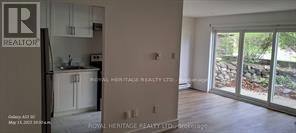 Photo - 945 Simcoe St N Unit 1