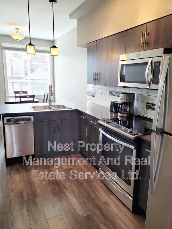 Photo - 110-110 Baxter Ave