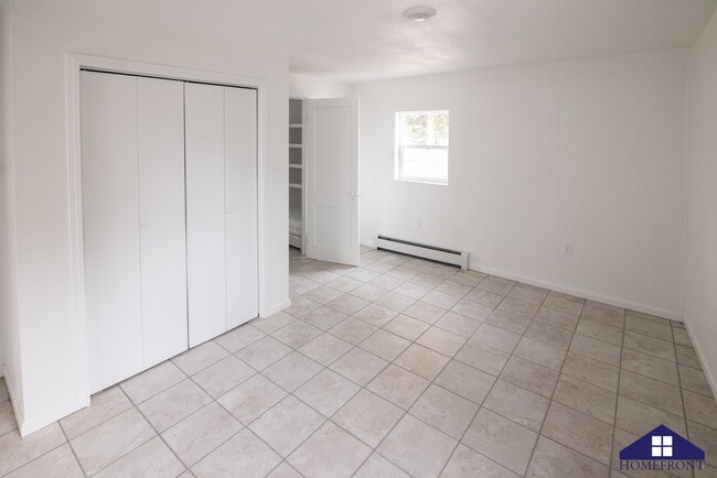 View across bedroom to closet and bath - 502 S 1st St Unit Apt. 1