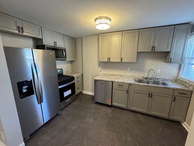Building Photo - 1210 Dennison Ave Unit 1210