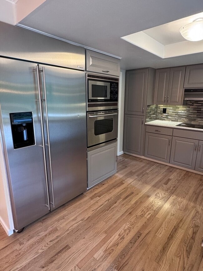 Photo - Spacious 4 Bed Home Backing to Private Woodland Trails! Finished Basement, Large Deck, Office, Pe...