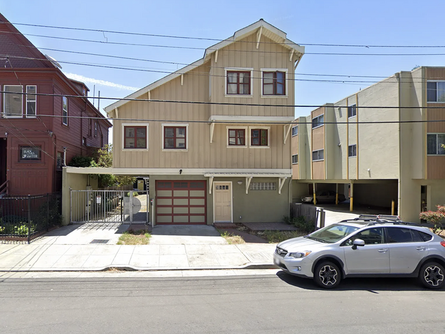 View from the street & of gated entrance/parking - 535 29th St Casa