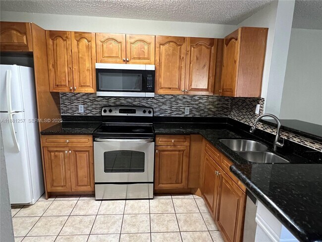 Photo - 11295 W Atlantic Blvd Unit 306