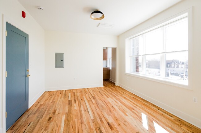 Building Photo - 6465 Sterling St Unit 304