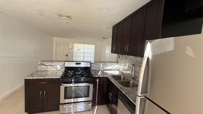 Photo - 520 SW 10th St Unit 1-2