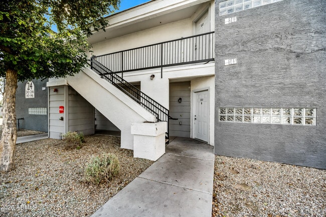 Building Photo - 3065 N 67th Ave Unit 145