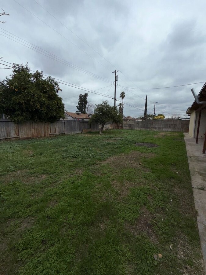 Photo - Coming Soon: 3-Bedroom Home with Covered Patio, 2-Car Garage & Large Driveway