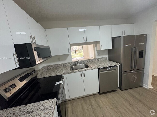 Building Photo - 1810 N Lauderdale Ave Unit 2109 Rental