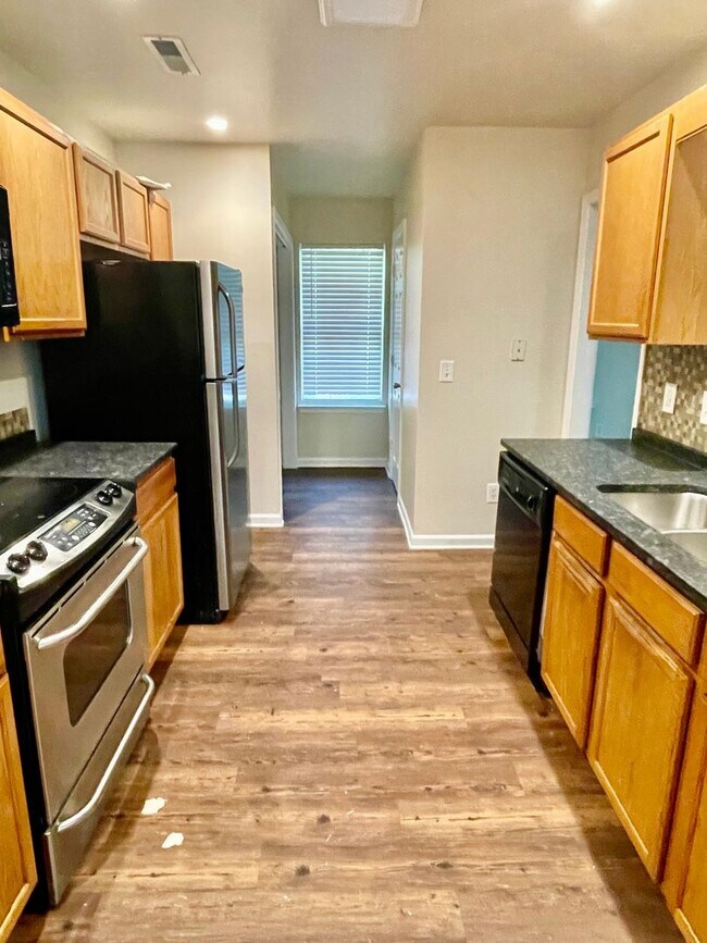 Photo - Spacious 4-bedroom, 2.5-bath home in Charlotte with convenient access to Uptown