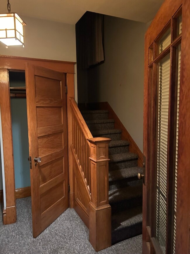 Classic craftsman entry with original hardwood moldings and trim. - 514 Electric Ave Unit 2 - Upstairs