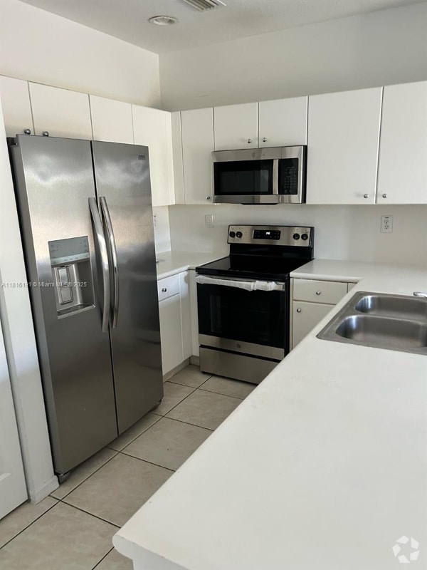 Building Photo - 5737 NW 114th Path Rental