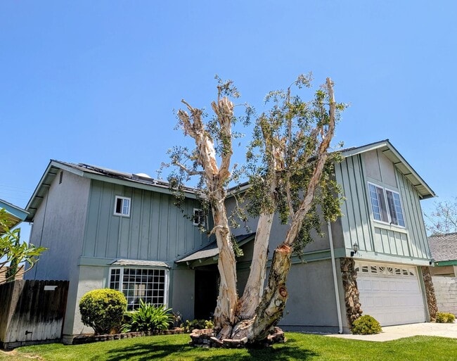 Photo - 2 stories - 4 Bedrooms + 2.5 Baths.  Swimming Pool + Solar Panels !!