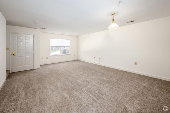 3BR, 3BA - 1,345SF - Living Room - Burnt Mills Crossing