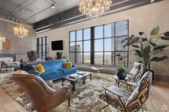Club Room with Lounge Seating and Double-Sided Fireplace