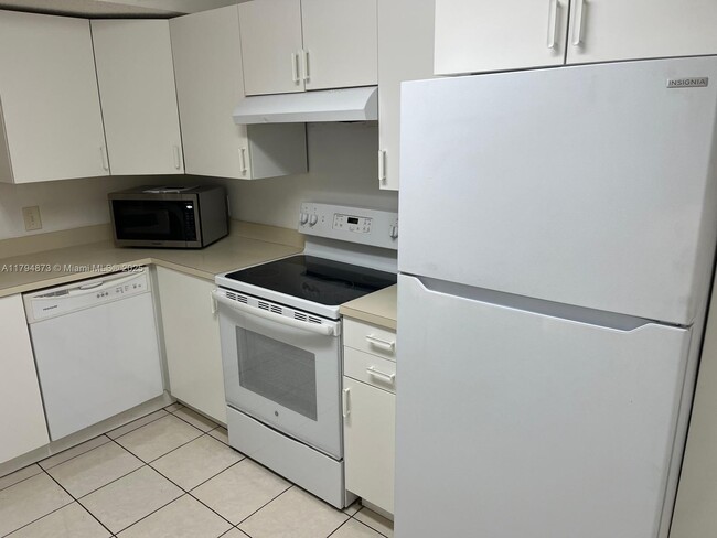 Photo - 9001 Wiles Rd Unit 103-3