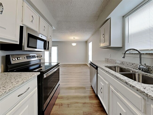 Photo - 3 BR/2BA | Renovated Single Family Home | 2-Car Garage | Gated backyard