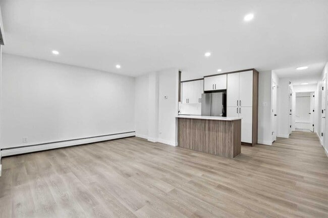 Photo - 110-424 24 Ave SW