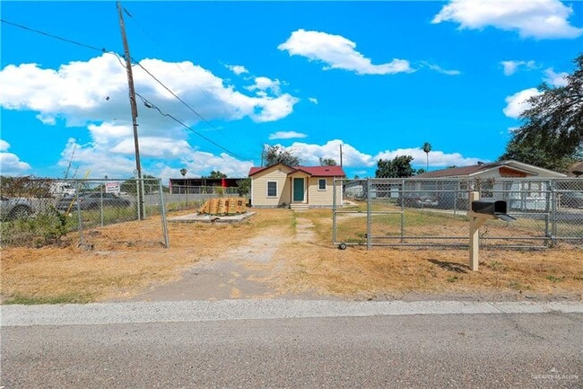 Photo - Charming 2-Bedroom Home with Central AC and Fenced Lot!