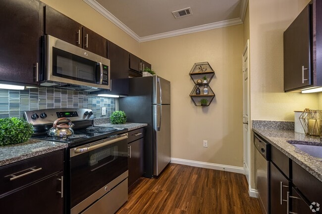 Building Photo - Escape the Norm with Modern Comfort! Unit HT1