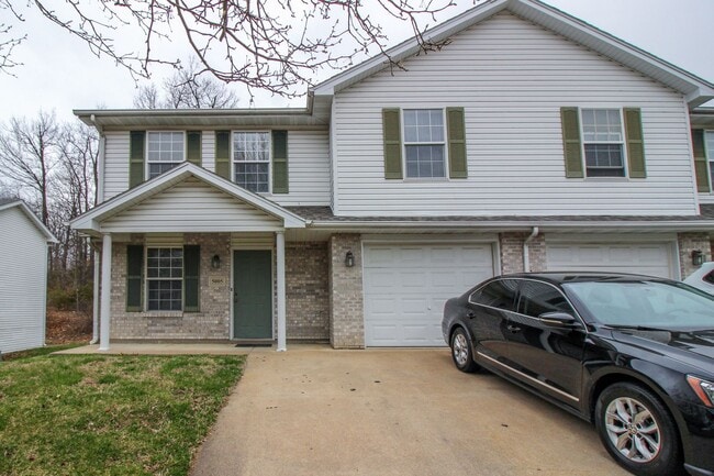 Photo - Spacious 4BR/2BA Duplex with 1 Car Garage & Washer/Dryer Included!