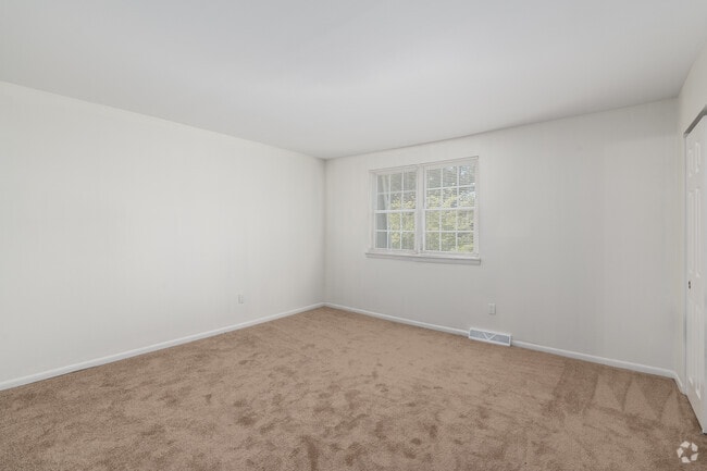 2BR, 1BA - 945SF - Primary Bedroom - Pine Grove Townhomes