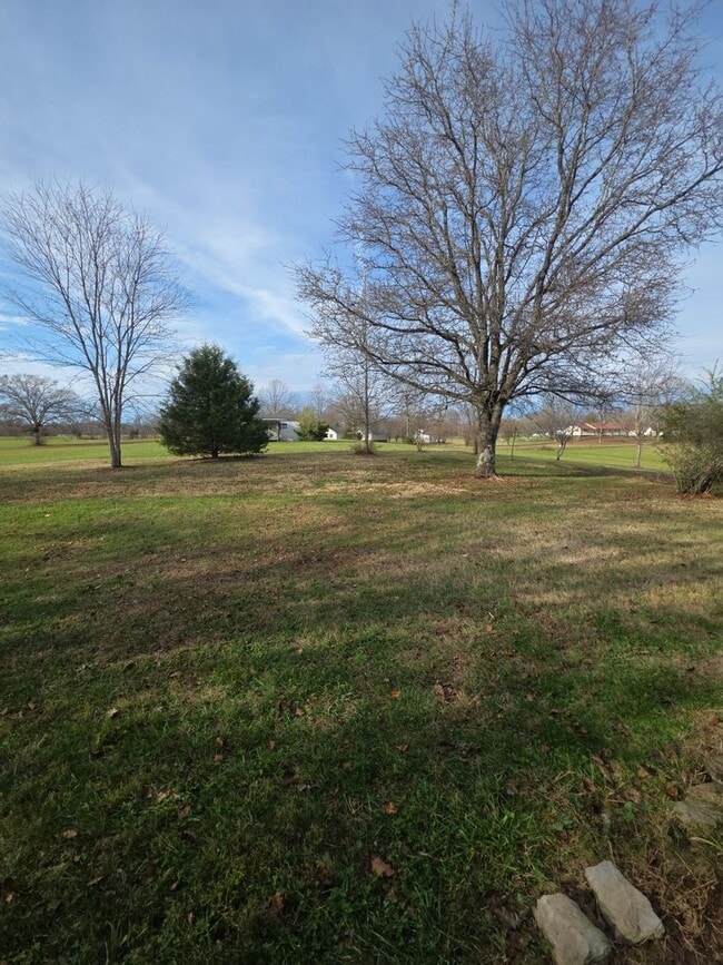 Photo - 2-Bedroom Handicap-Accessible Home with 3-Season Porch, Garage, and Large Yard