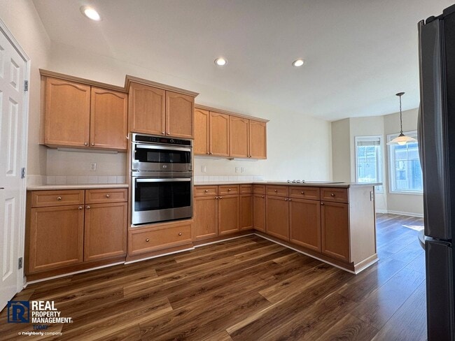 Photo - Beautiful 2-Bedroom Townhome with Vaulted Ceilings & 2-Car Garage!!