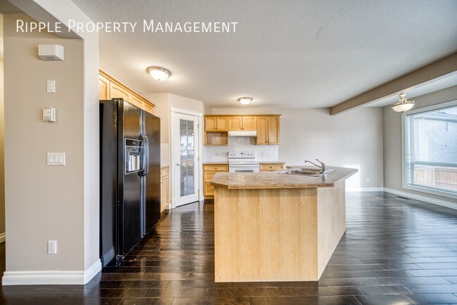 Building Photo - Cozy 3 bedroom+ den 2.5 bathroom house in the community of Airdrie