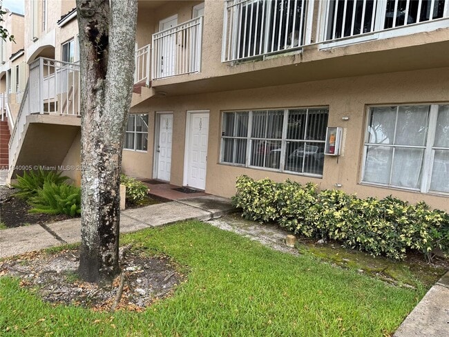 Building Photo - 8670 NW 6th Ln Unit 4-107 Rental
