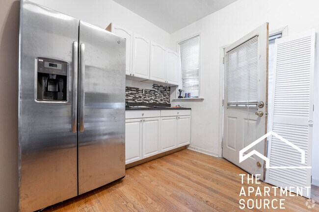 Building Photo - 907 W Belmont Ave Unit 2f Rental