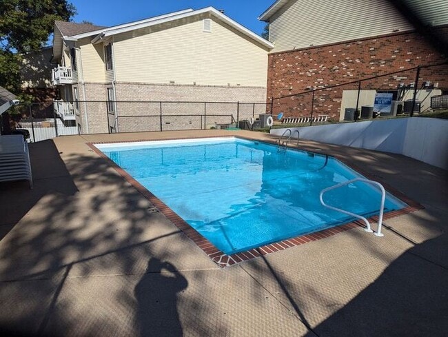 Photo - St. Charles Condo, Large Living Room, Private Pool, Storage, Balcony