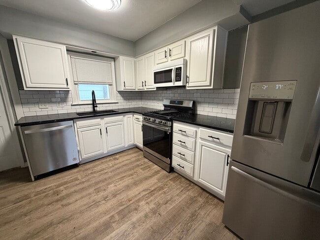 Building Photo - Spacious 4-Bedroom Home with First-Floor Convenience and Great Outdoor Space