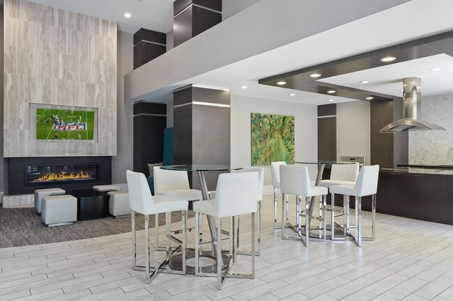 The two-story clubhouse includes a fireplace and entertainment kitchen