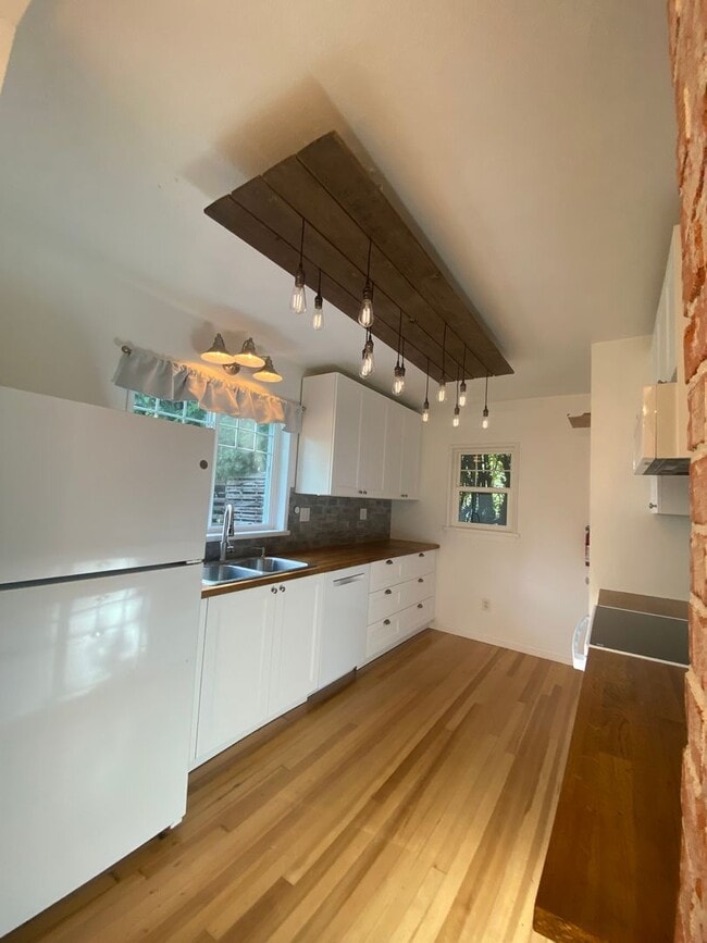 Photo - Perry District Gem – Move-In Ready 3 plus Bed / 2 Bath Brick Home with Finished Basement & 2-Car ...