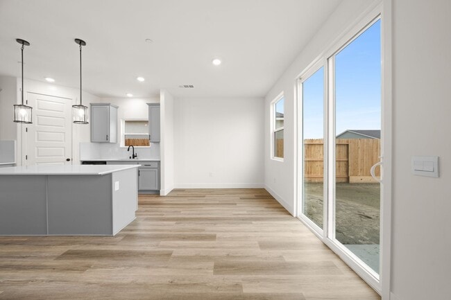 Photo - Brand New, 4 Bed, 2 Bath Home with Paid Solar and 2-Car Garage