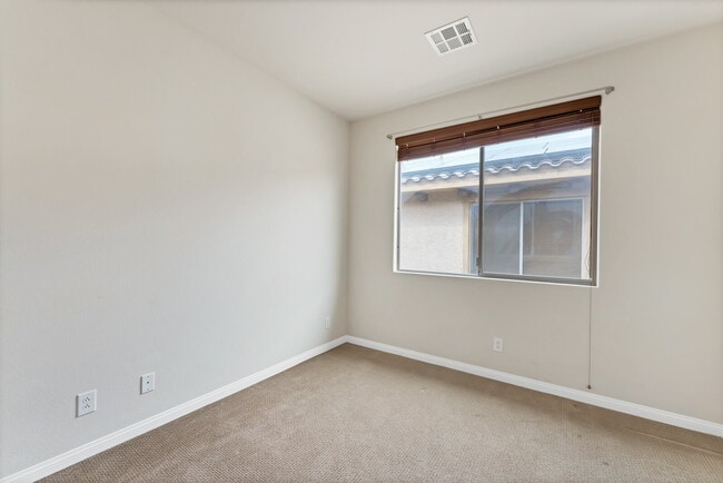 Photo - "Charming 3-Bed Oasis with 2 Baths in Henderson – 1716 Sq Ft of Comfort!"