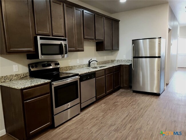 Building Photo - 165 S Guadalupe St Unit 214