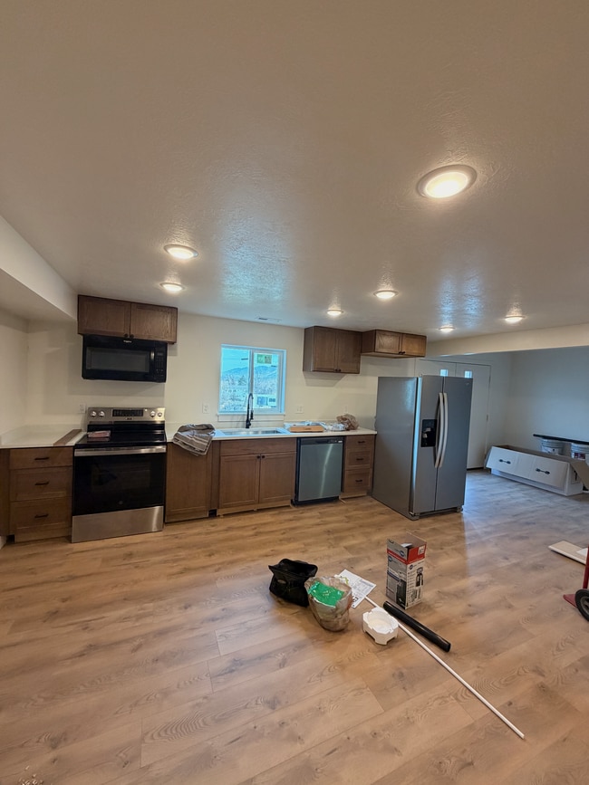 Stainless steel appliances in kitchen. - 14 N 300 E